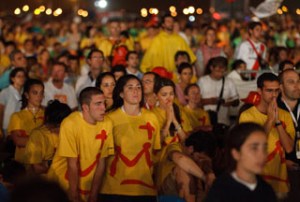 PIGLRIMS PRAY DURING EUCHARISTIC ADORATION AT WORLD YOUTH YOUTH DAY VIGIL IN MADRID